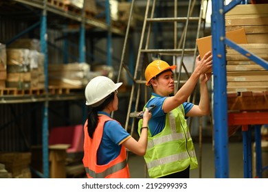 Shot Of Female Managers And Male Worker Checking Inventory And Quantity Of Storage Product On Shelf In N A Large Warehouse