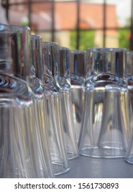 Shot Glasses Lined Up On Table 