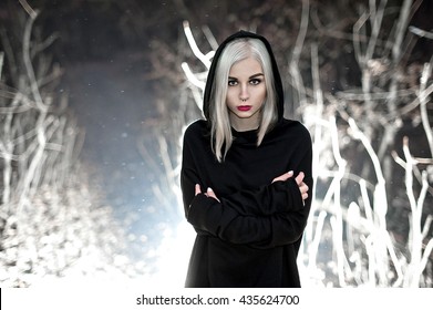 Shot Of A Gothic Woman In A Forest. Fashion.