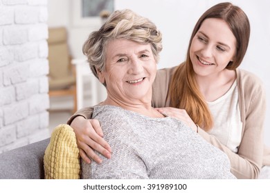 Shot of a granddaughter hugging her grandma