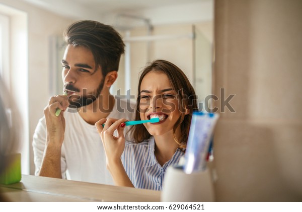 Shot Happy Couple Bonding While Brushing Stock Photo (Edit Now) 629064521