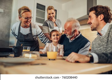 Shot of a happy family during breakfast - Powered by Shutterstock