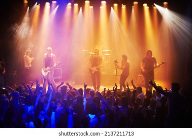 Shot Of A Large Crowd At A Music Concert-This Concert Was Created For The Sole Purpose Of This Photo Shoot, Featuring 300 Models And 3 Live Bands. All People In This Shoot Are Model Released