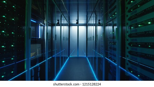 Shot Of A Long Hallway Full Server Racks In A Modern Data Center
