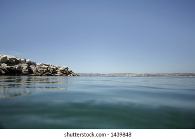 A Shot Looking Out To Sea In Marseille Taken With Underwater Camera, Half Submerged