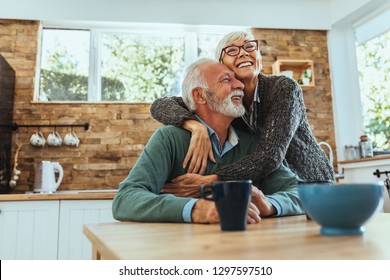 Shot of a mature woman hugging her husband