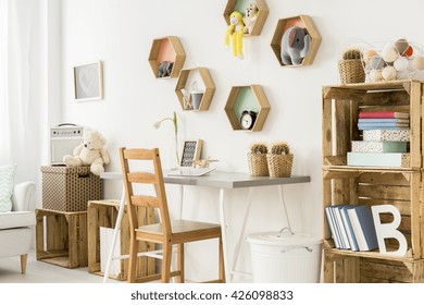 Shot Of A Modern Children's Room Full Of Wooden Furniture