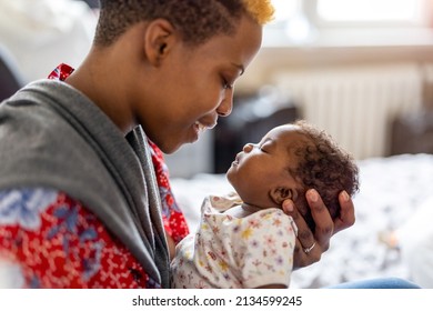 Shot of a mother spending time with her newborn baby
