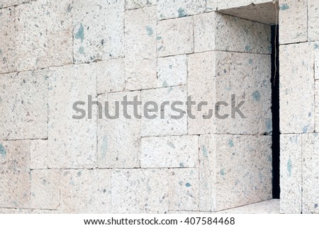 A shot of a narrow window in a wall