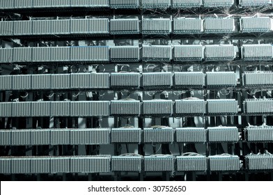 shot of network cables and servers in a technology data center(See more network cables and servers backgrounds in my portfolio).