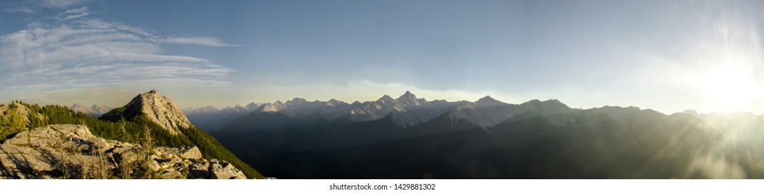 Shot of never ending mountain range next to the Banff Gondola was taken during my first trip to the Canadian Rockies shortly before sunset. I have never forgotten the view. - Powered by Shutterstock