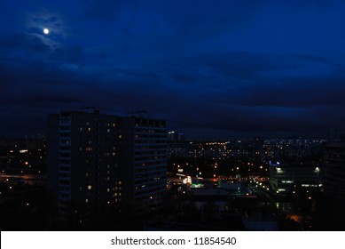 A Shot Of The Night City On Dark Sky Background