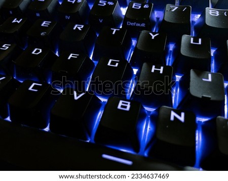 A shot of a PC keyboard with implied hacking activity, symbolizing cybersecurity threats.