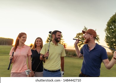 Shot Of People On A Golf Course