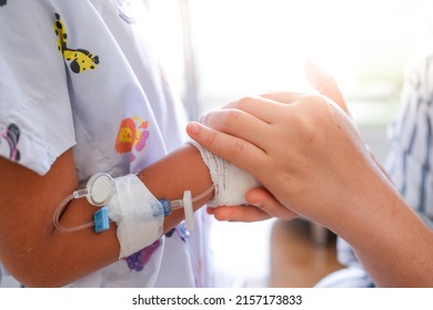 A Shot Of Peripheral Venous Catheter In A Child's Arm