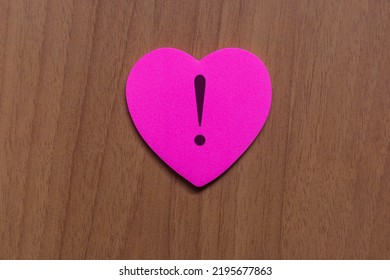 Shot Of A Pink Paper Heart, Where An Exclamation Mark Is Drawn Above