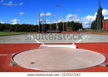 Shot put start. Throwing heavy ball athletics. Bålsta, Stockholm, Sweden, Europe.