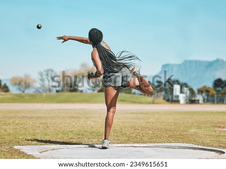 Shot put, woman and athlete throw in competition, championship or training for field event with metal or steel weight. Throwing, ball or female in athletics sport on outdoor field for olympics