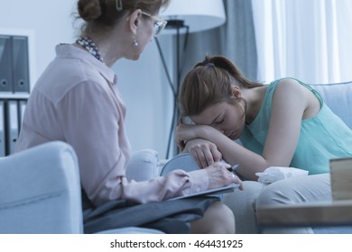 Shot Of A Really Tired Woman On A Meeting With Her Psychotherapist