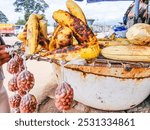 A shot of roasted ripe plantains with roasted peanuts for sale by the streetside in Ghana 