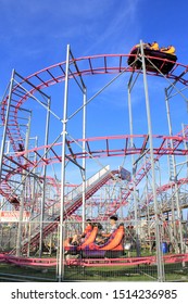 A Shot Of A Roller Coaster At The Kansas State Fair In Hutchinson Kansas USA With Blue Sky On 9-15-2019.