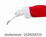 Shot of an Santa Claus hand using a dessert fork isolated on a white background