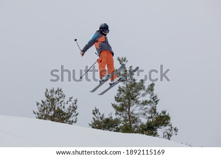 A shot of a snow skier during an impressive jump at the Maryland open freestyle competition