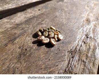 shot of some coffee beans that are on the floorboard