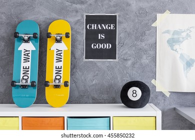 Shot Of A Teens Room Interior With Posters And Skateboards Lying On The Shelf 