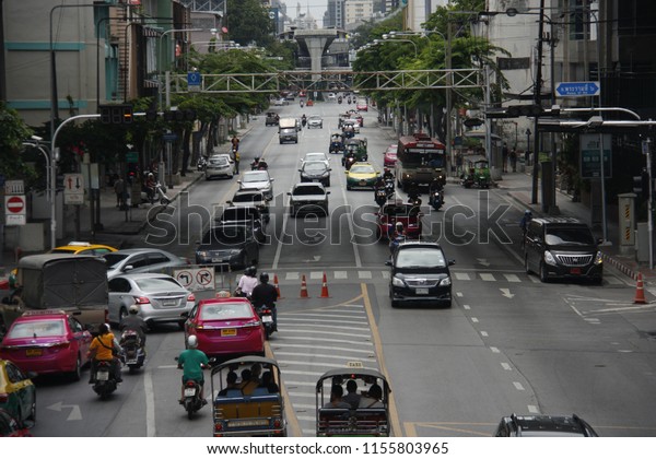 A shot of traffic\
around Rama VI Intersection / Rama I Rd. in Bangkok, Thailand on\
5th August 2018.