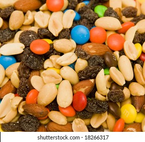 A Shot Of Trail Mix Including Nuts, Raisins, And Candy Covered Chocolate