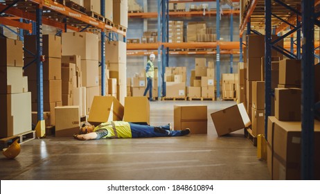 Shot Of A Warehouse Worker Has Work Related Accident. He Is Falling Down BeforeTrying To Pick Up Heavy Cardboard Box From The Shelf. Hard Injury At Work.