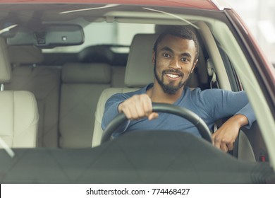 Shot Of A Young Attractive Man Smiling Happily Sitting In A New Automobile Copyspace Driving Owner Insurance Car Sales Retail Buyer Buying Comfort Lifestyle Travelling Safety Insurance Offer Discount