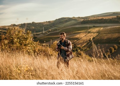 Shot of a young backpacker looking at a view during a hiking day in nature. Copy space.