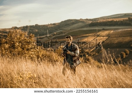 Shot of a young backpacker looking at a view during a hiking day in nature. Copy space.