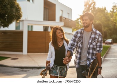 Shot Of A Young Couple Enjoying Spending Quality Time Together In The Summer.