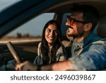 Shot of a young couple going a road trip together