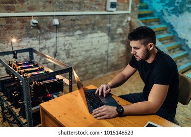 shot-young-man-setting-cryptocoin-260nw-1015146523.jpg