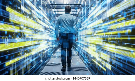 Shot of a Young It Specialist Walking through Corridor in Working Data Center Full of Rack Servers and Supercomputers. Conceptual Visualisation of High Speed Internet Connection with Yellow Lines.