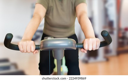 Shot of a young woman using an exercise at the gym - Shutterstock ID 2224939869