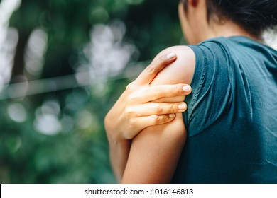 Shoulder Injuries , Woman With Pain In Shoulder And Upper Arm ,Ache In Human Body , Office Syndrome , Health Care Concept