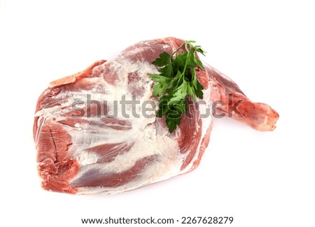 shoulder of lamb in front of white background