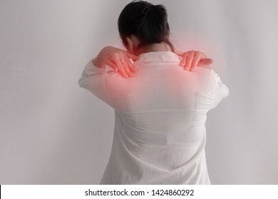 Shoulder Pain Woman On Isolated White Background, Back View.