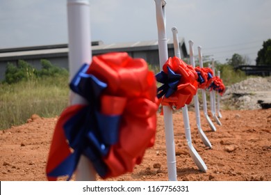 Shovel Decorate With Ribbon For Groundbreaking Ceremony With Beautiful Clear Blue Sky