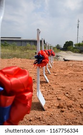 Shovel Decorate With Ribbon For Groundbreaking Ceremony With Beautiful Clear Blue Sky