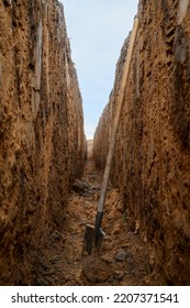 Shovel In A Deep Trench. Digging A Ditch, Clay Soil.