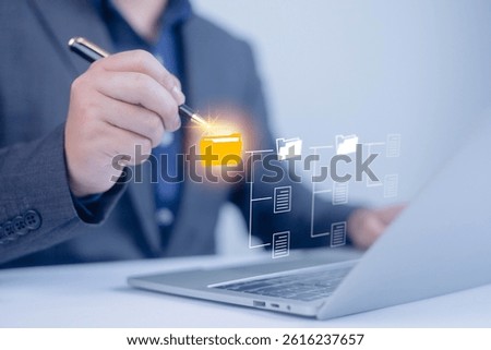 Show document management system on laptop. Businessman show managing system corporate file information, document work management with technology software for archiving, document, quality, file
