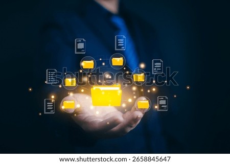 Show document management system on hand. Managing corporate file information, document work management with technology software for archiving, document, technology, quality, file