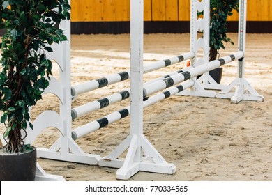 Show jumping barriers on the ground. Arena for equestrian sports