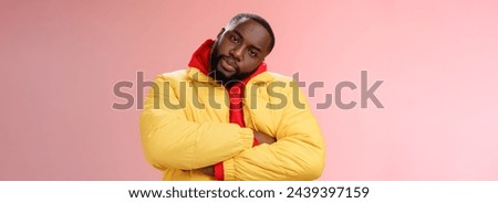 Show me whatcha got. Portrait cool stylish serious-looking urban black bearded guy in trendy yellow hoodie cross arms over chest tilting head wanna see what prepared rival standing confident.